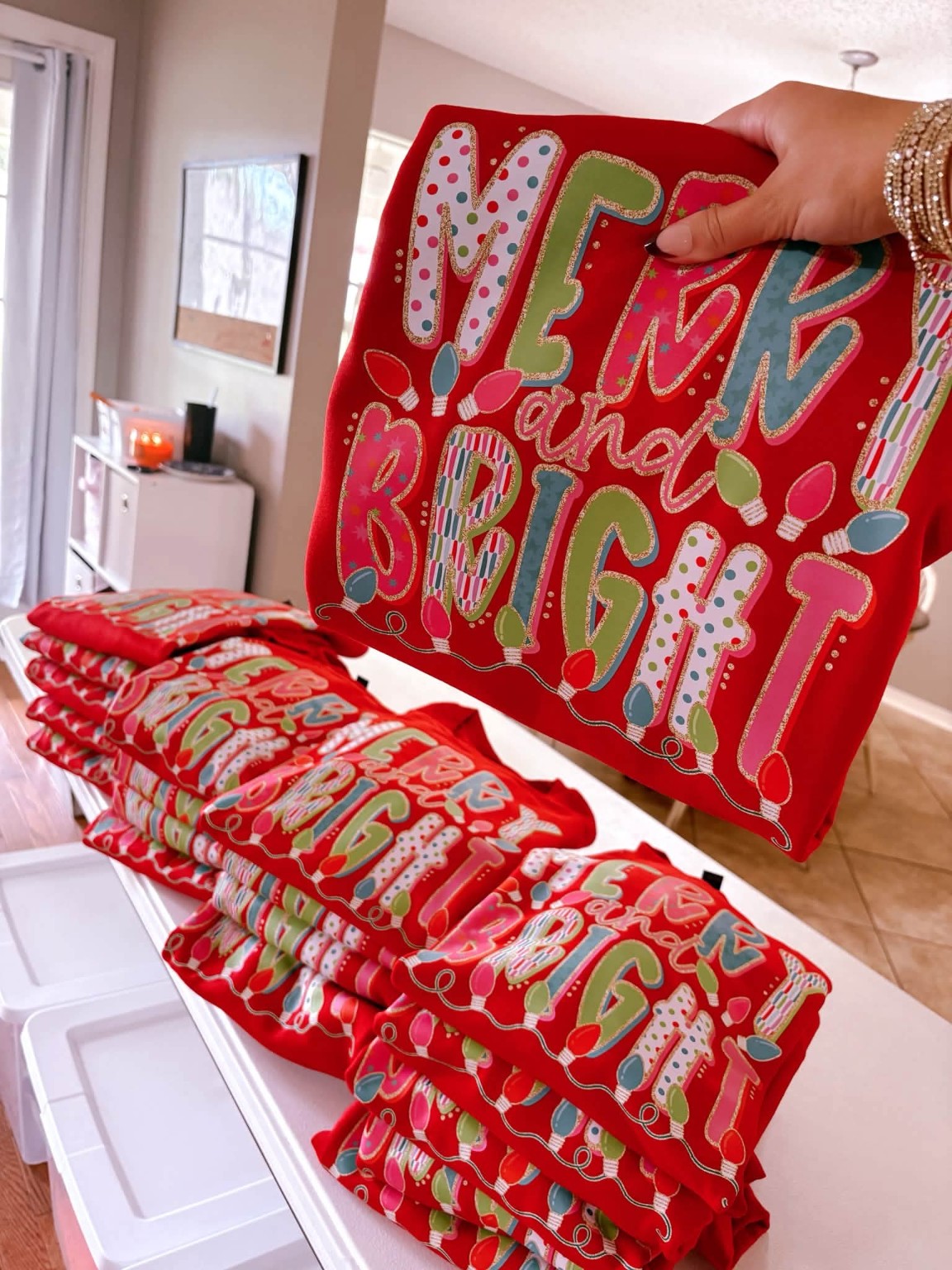 Merry and Bright Christmas crewnecks stacked